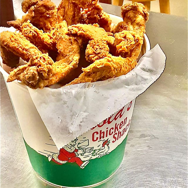 24 Whole Wings w/ Free Side or 2L Pop.