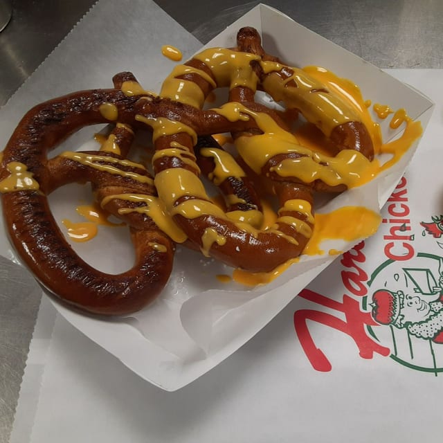 2 Pretzels w/ Cheese and Pop.